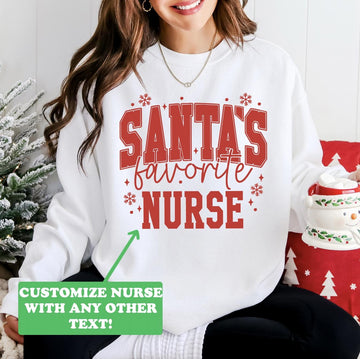 Santa's Favorite Nurse DTG Printed Christmas Sweatshirt or T-Shirt | Cute Holiday Graphic Tee | Pink Christmas Shirt